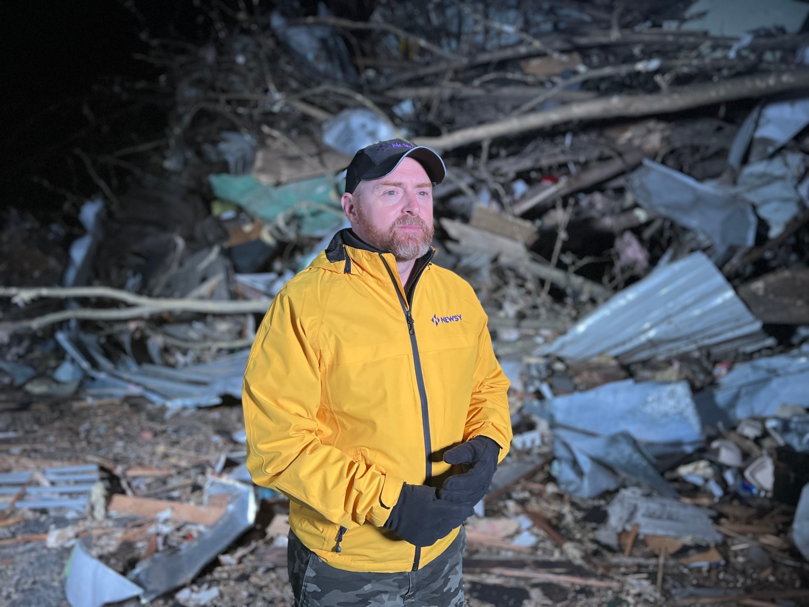Scott Withers reporting live from tornado damage at night